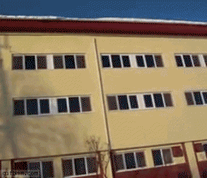 Snow Falls From A Roof GIF